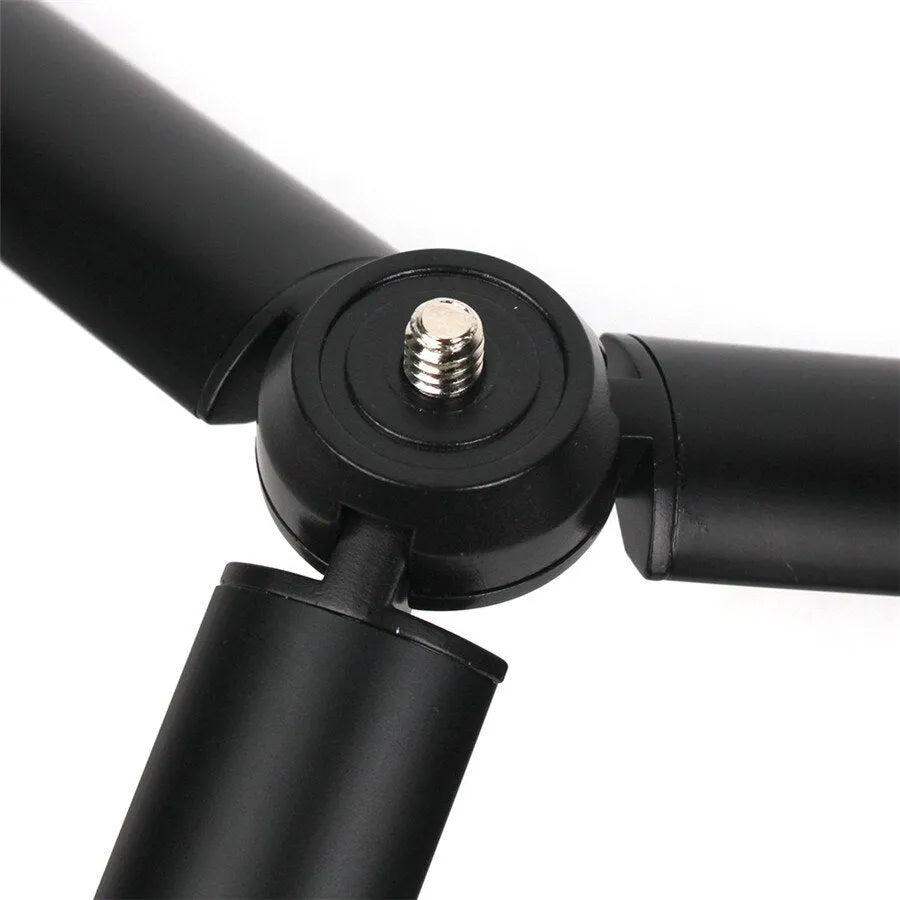 Black aluminium alloy mobile phone tripod handheld stabiliser compatible with iPhone