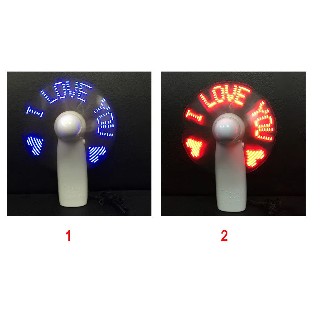 White handheld mini fan with blue and red LED lights flashing 'I Love You' pattern.