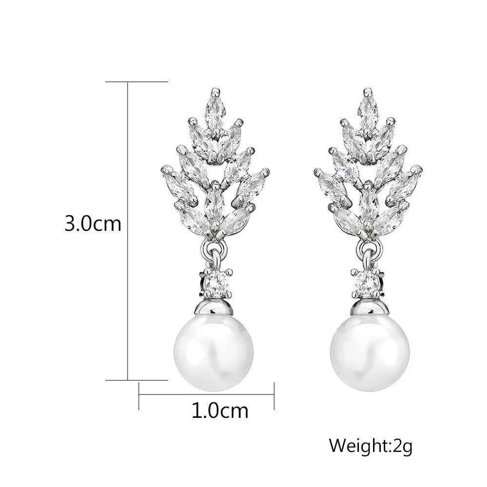 Geometric flower design earrings with micro inlaid zircon and pearl accents in gold, platinum, and rose gold plating.