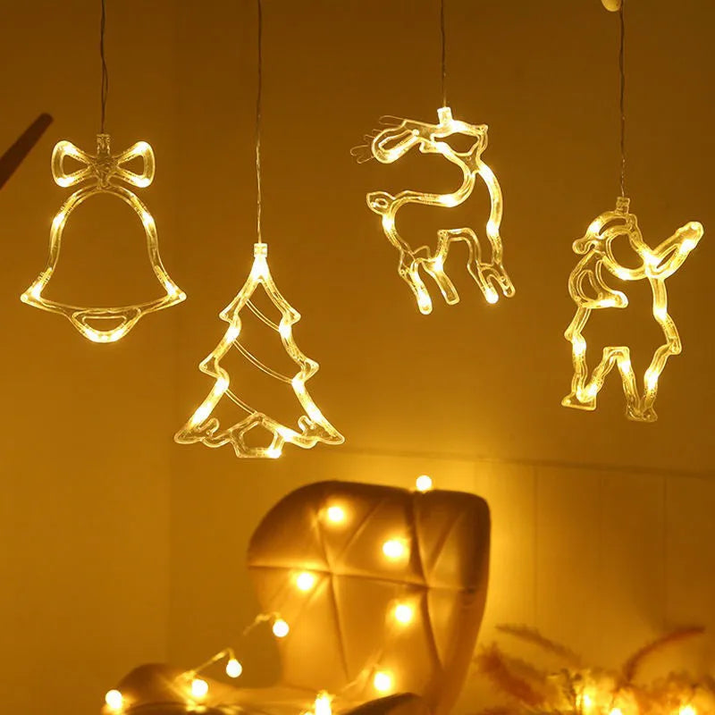Battery-powered LED Christmas chandelier with suction cups, showing Santa Claus and snowman shapes