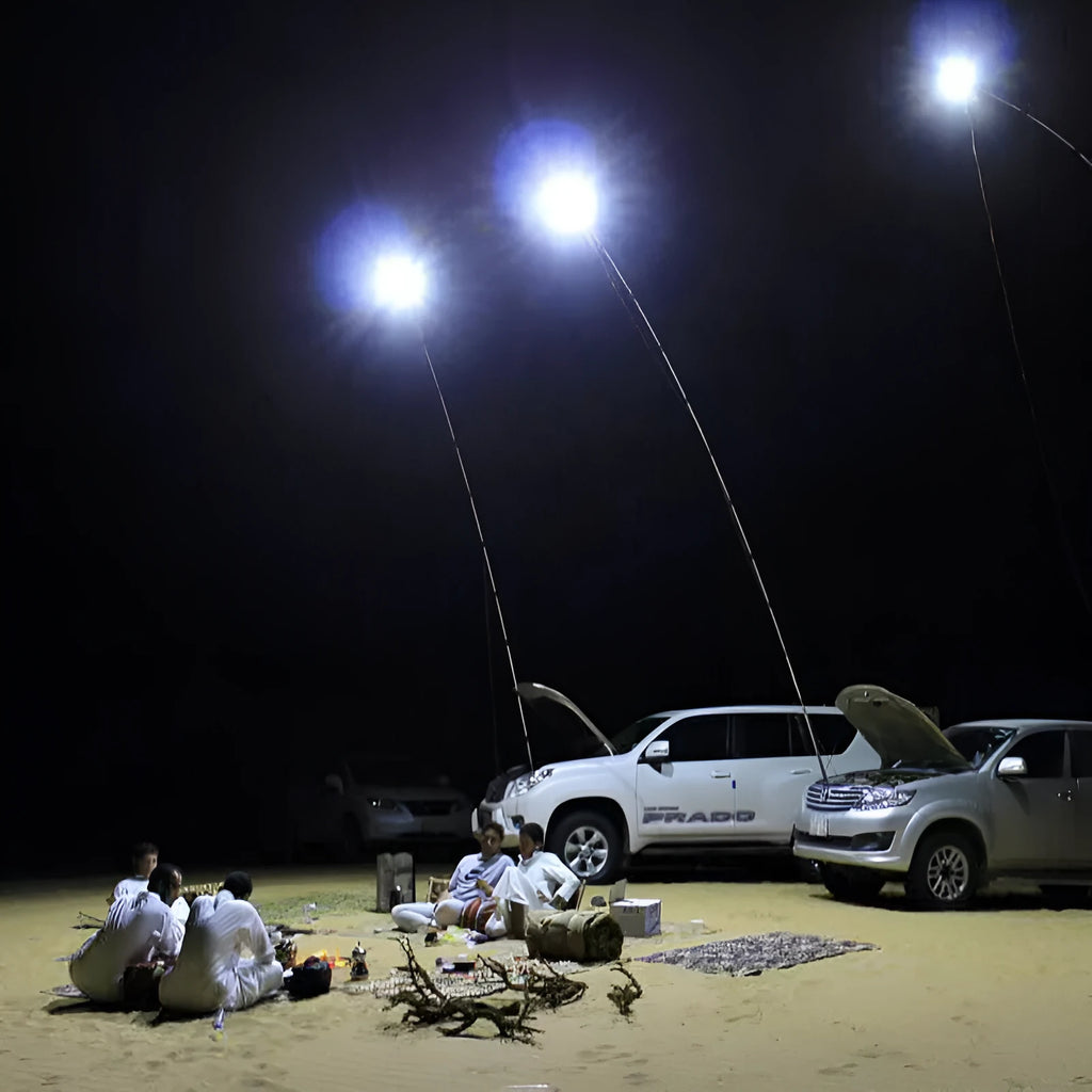 LED fishing rod light with telescopic pole extended, showing white LED array and remote control