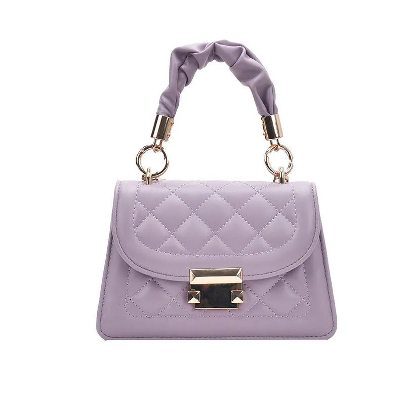 Purple rhombus-shaped small square ladies bag with chain-link shoulder strap on a white background