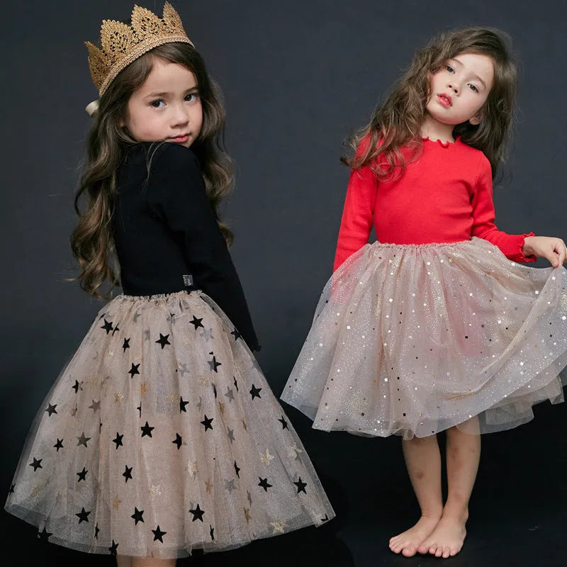Red cotton long sleeve princess dress for a young girl with lace and bow details for Christmas.