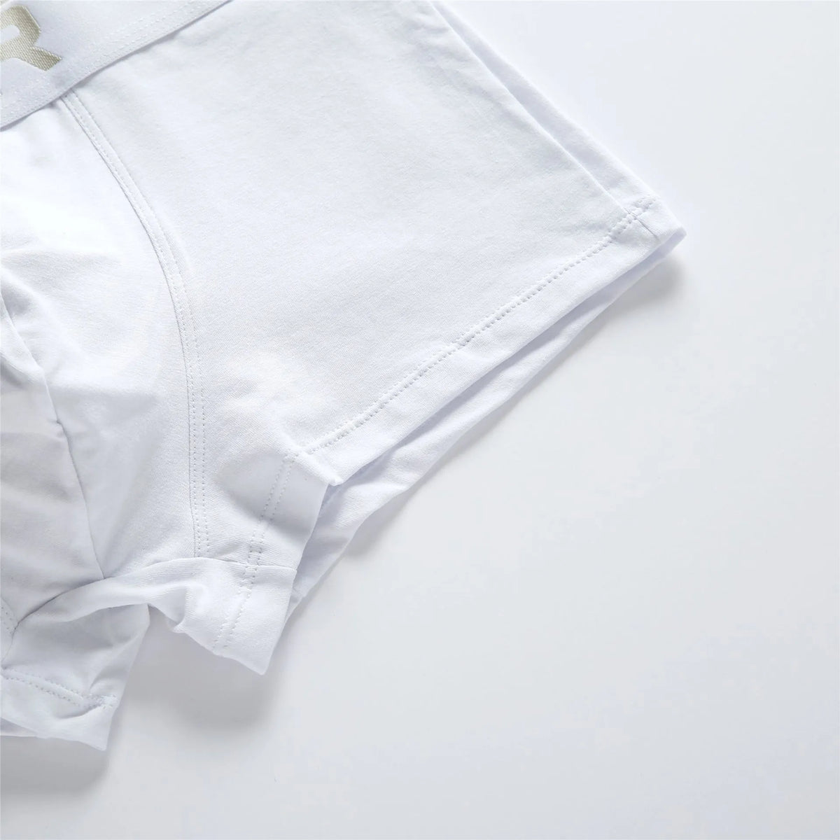 Men's purified cotton low waist boxer shorts in solid white, black, or grey, sizes M to XXL
