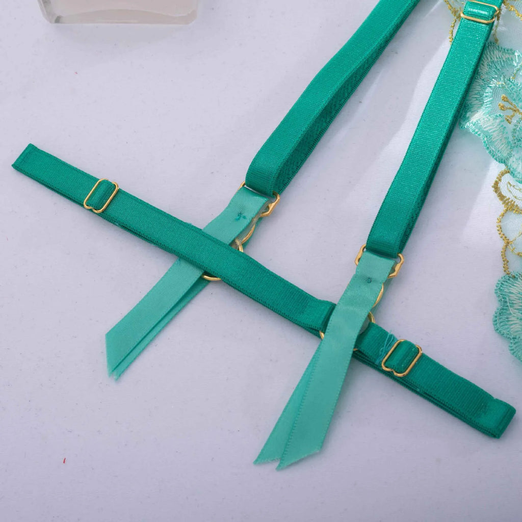 Light green women's bra set with embroidery detailing showing front view of three-point style construction