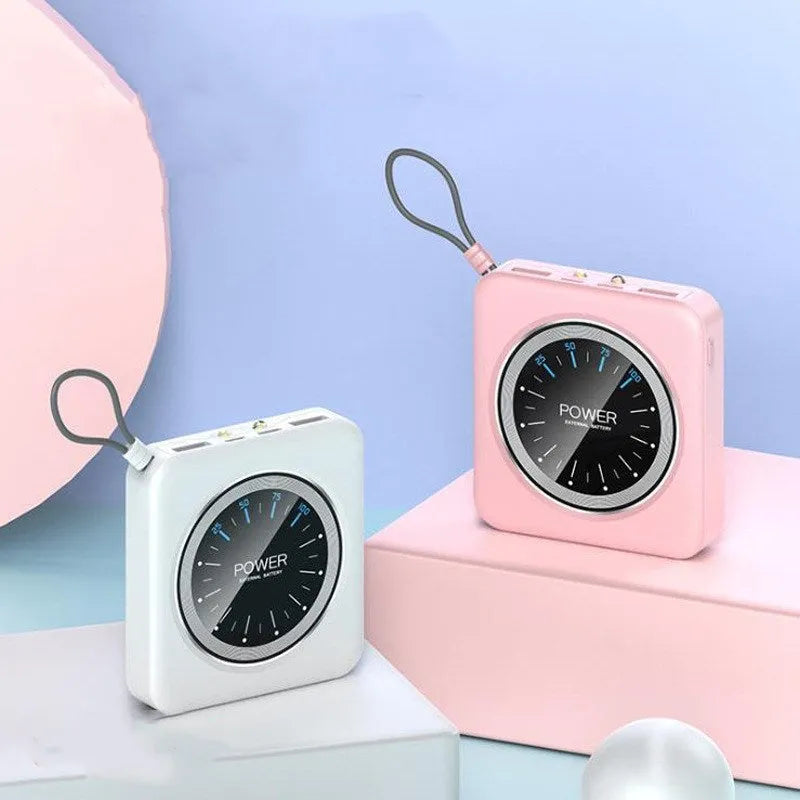 Alloy-case portable power bank with digital clock display in mint green, showing its multi-U port and compact size.