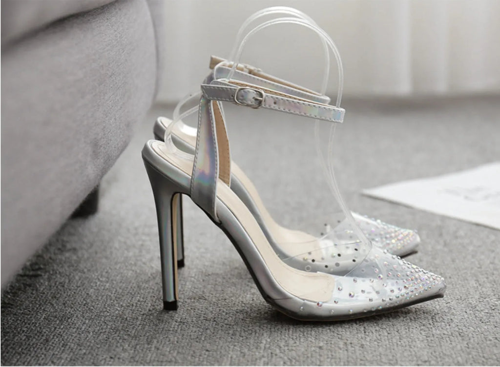 Women's pointed-toe sandals with diamond decoration and a thin stiletto heel.