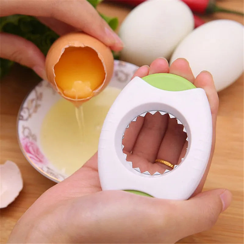 Manual kitchen egg opener with stainless steel cutting edge in green colour, dimensions 8.3 by 5.7 by 1.8 cm