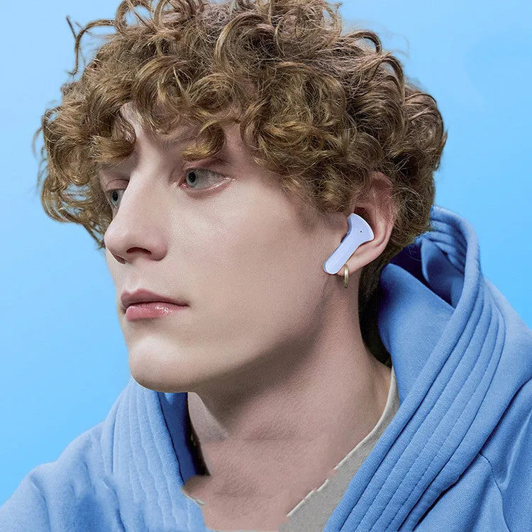 Mini wireless Bluetooth headset with LED power display, silicone case, earplugs, and USB-C charging cable on a grey background.