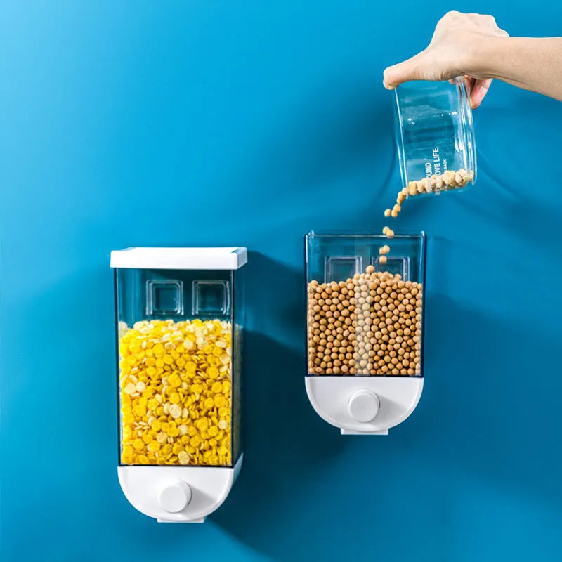 White wall-mounted transparent food storage box cereal dispenser on kitchen wall