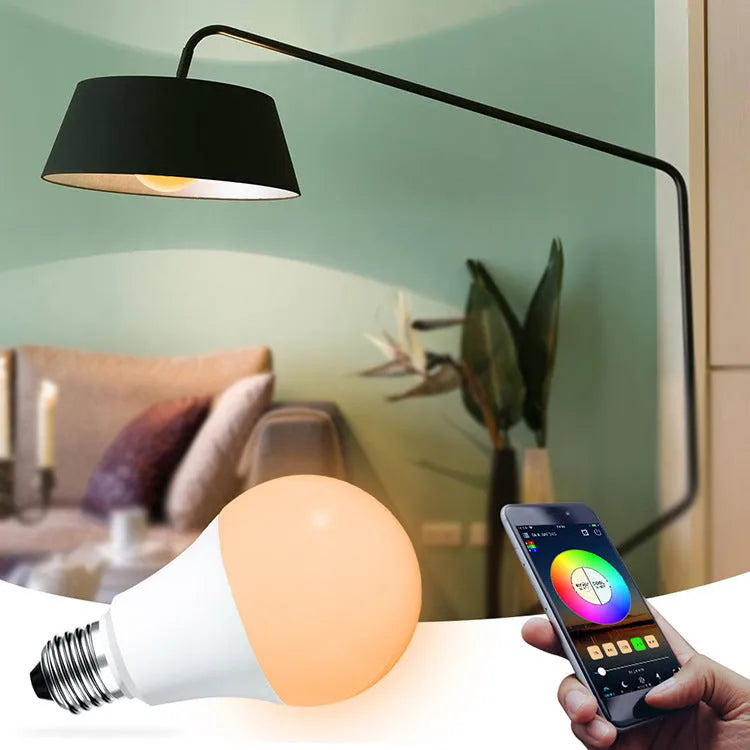A white smart WiFi LED light bulb with a standard E27 screw base, shown with colourful light effects.