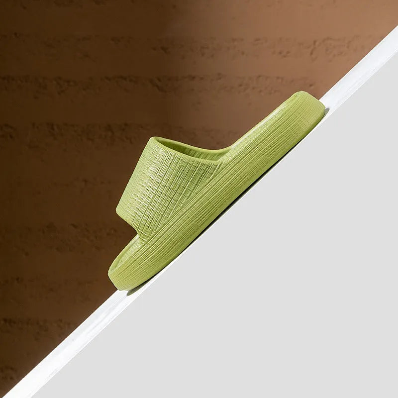 A pair of soft EVA flip flop slippers with a toe ring and non-slip sole, shown in one of five available colours.