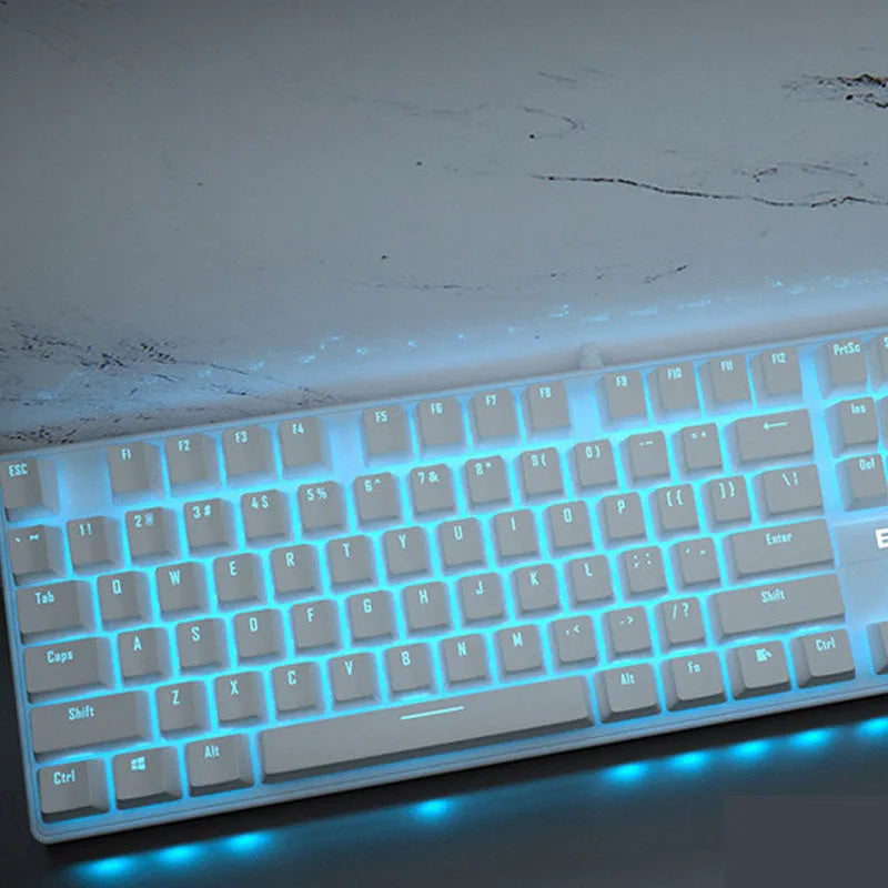Girly pink coloured 104-key wired mechanical keyboard on a desk