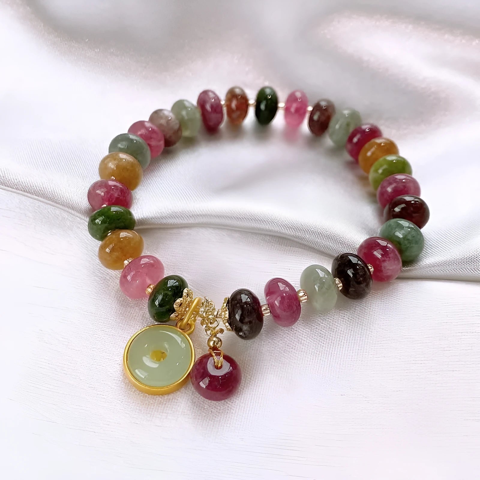 Handmade colourful tourmaline abacus bead bracelet with geometric rabbit pendant