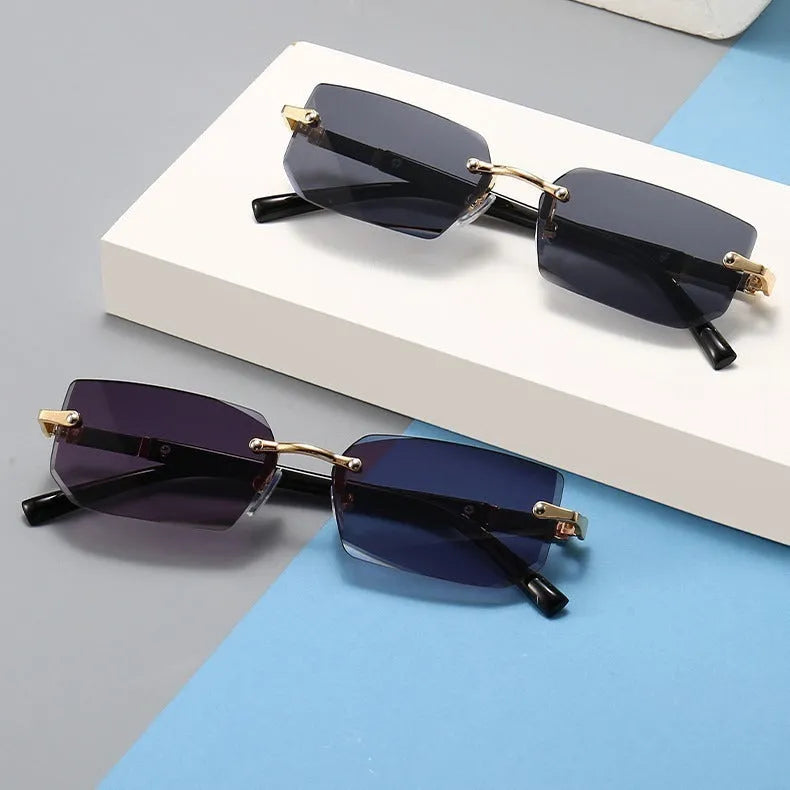 Unisex frameless water drop sunglasses in black, transparent, gold and gradient grey for sun protection and outdoor wear
