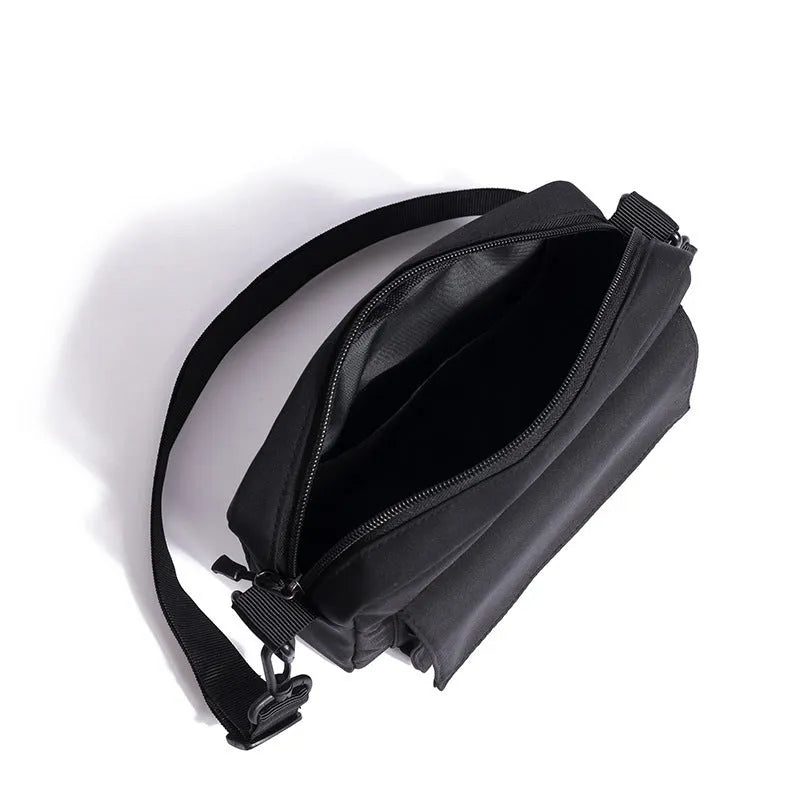 Men's lightweight nylon shoulder bag in black with messenger style for student travel and business use