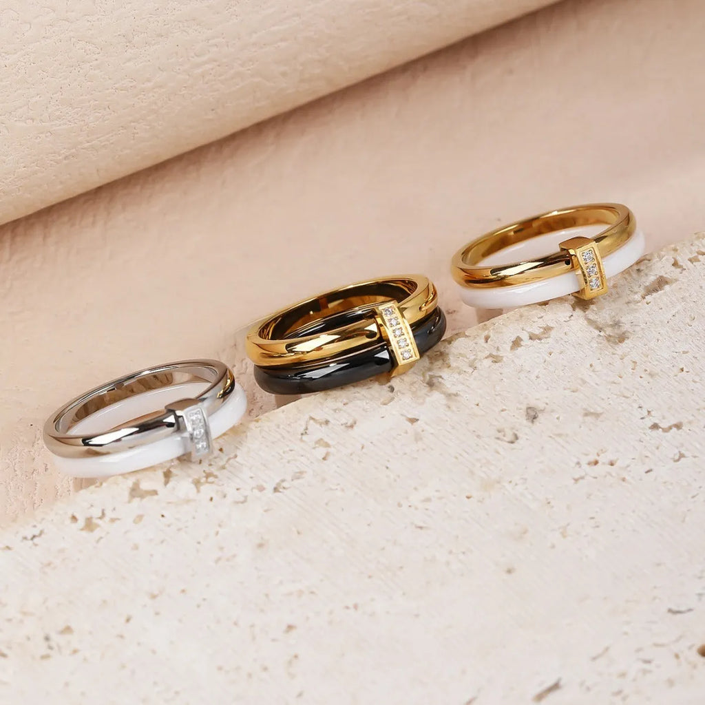 Women's titanium steel heart-shaped double ring with glossy stitching and inlaid zirconium stones
