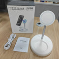 White vertical wireless charging stand for phone with visible cooling holes, showing phone charging in upright position.