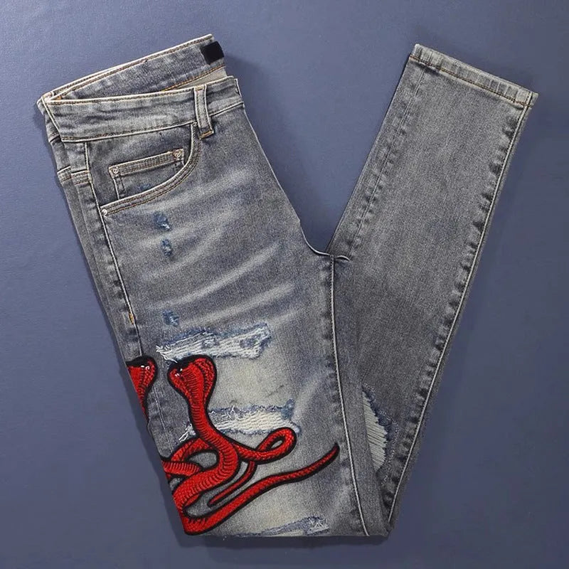 Men's slim fit distressed jeans with hole patches and embroidery in washed-out old colour