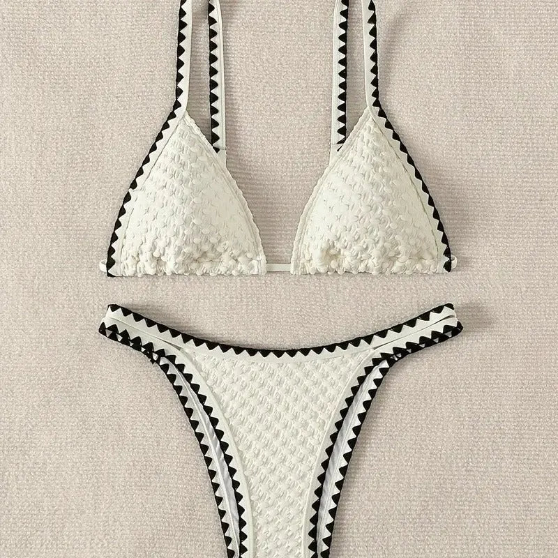 Women's split bikini swimsuit in briefs style available in white or blue colours