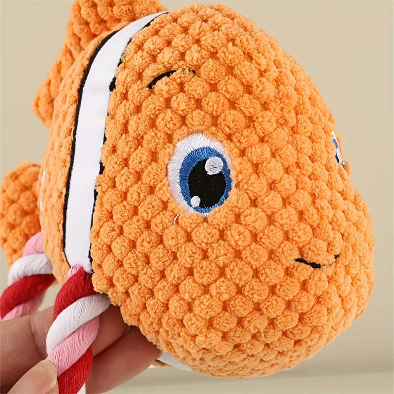 Turtle shaped dog chewing toy in green colour showing plush fabric and rope knot construction