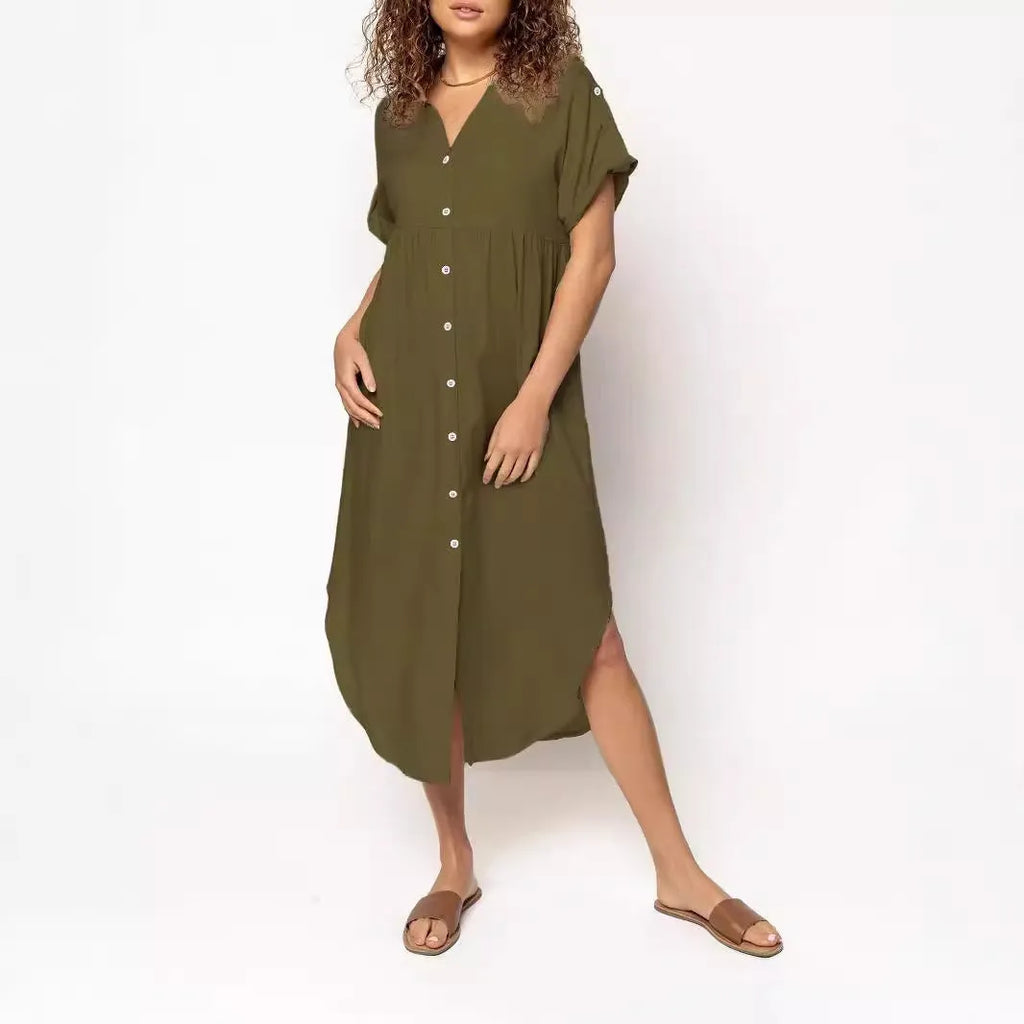 Loose mid-length casual dress in solid colour with button front detail, shown on a hanger.