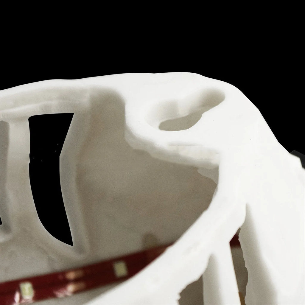 Eagle-shaped wall lamp with 3D printed resin body and projector lighting