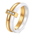 Glossy black ceramic women's ring with round zirconium stones on a geometric 6mm band.