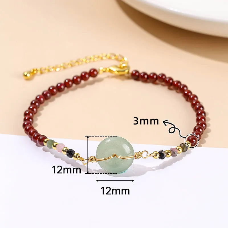 Women's crystal agate bracelet with garnet peace buckle safety clasp and round bead design