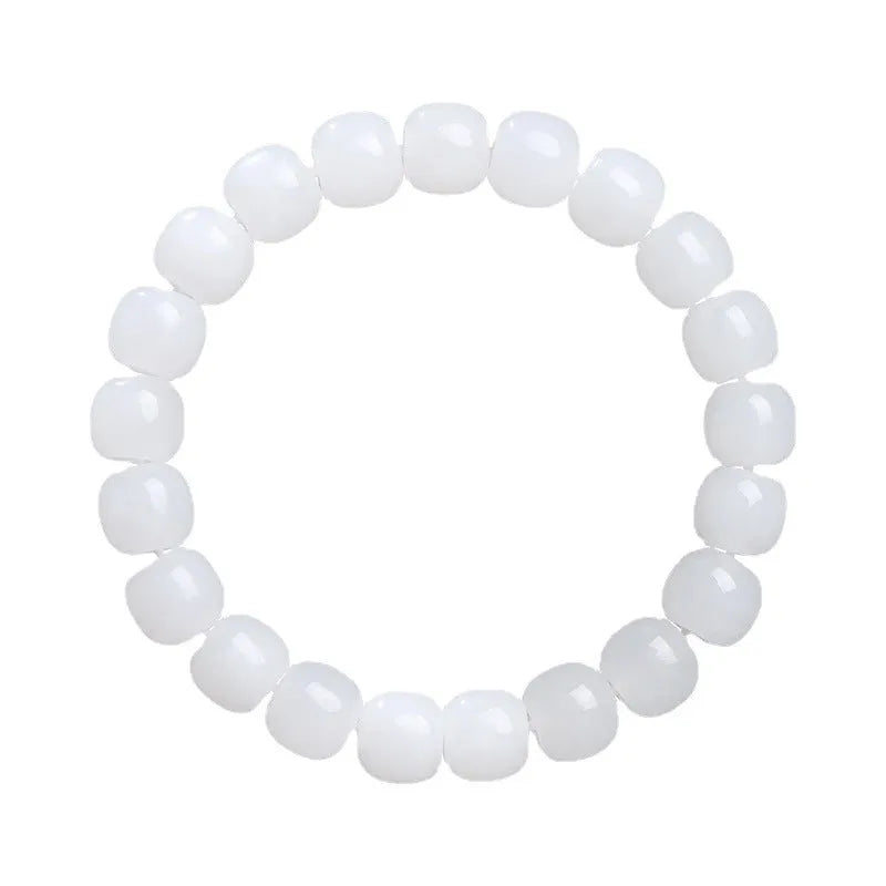 White Hetian jade barrel bead bracelet for men and women showing polished beads.