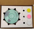 Red and green baby electric nail polisher sets with grinding heads for infant care.
