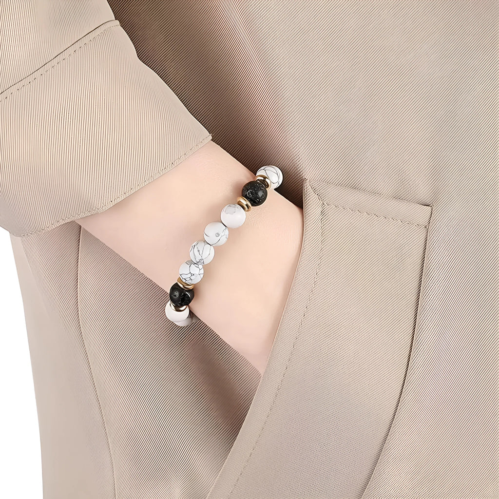 Handmade alloy charm bracelet with natural stone beads in colours like green tiger eye, blue stone, or black agate.