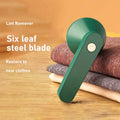 White or green USB rechargeable electric lint remover with a removable lint collection container
