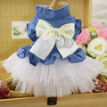 Korean style light blue denim skirt for a dog with a large white bow on the back