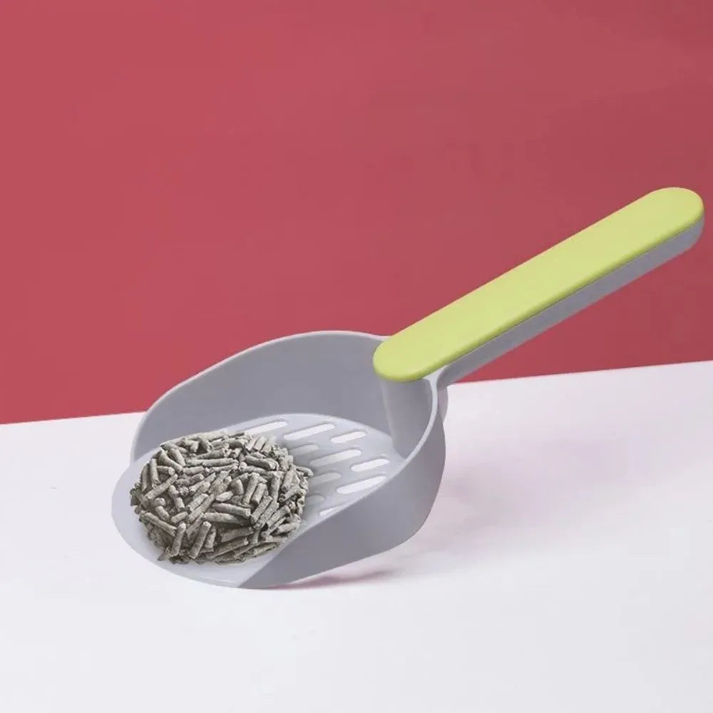 Blue plastic cat litter scoop for cleaning pet litter boxes.