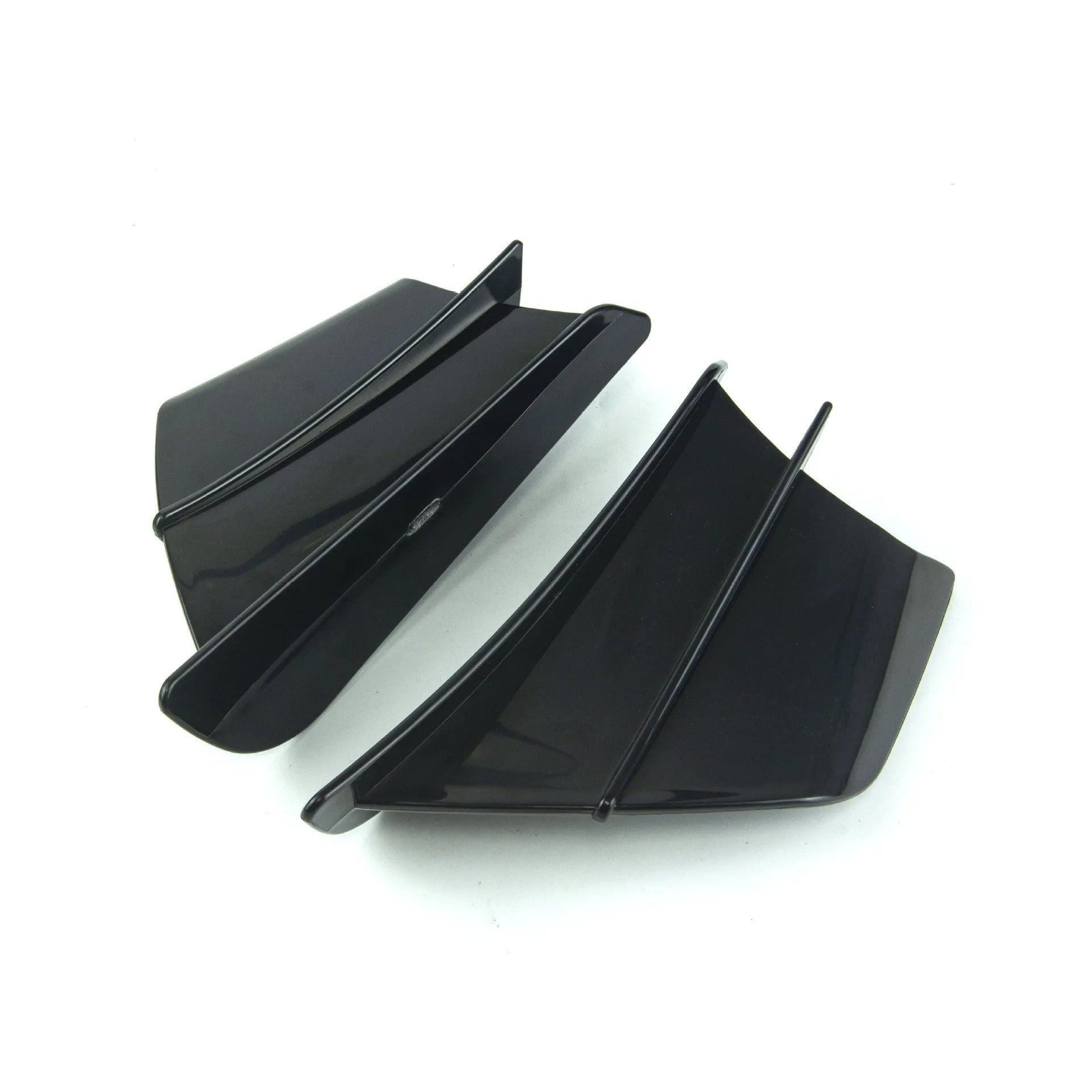 Universal motorcycle spoiler wings in four finish options: pure black, glossy forged, glossy carbon fibre, and elegant black carbon fibre pattern
