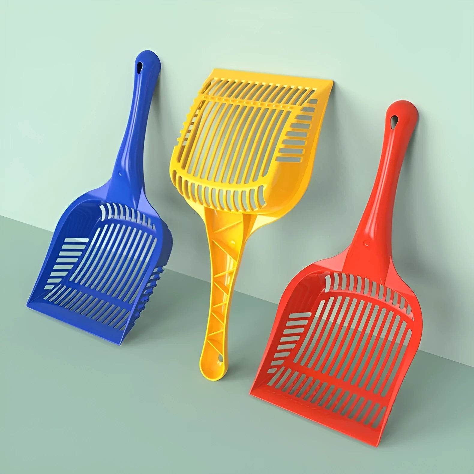 PP plastic cat litter scoop in red, yellow, or blue available in small or medium sizes