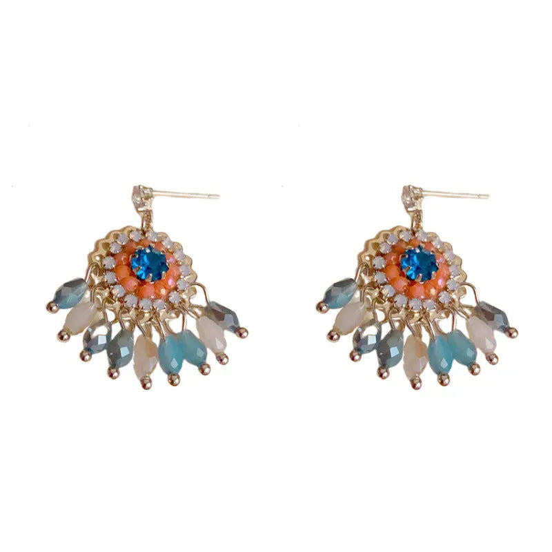 Geometric diamond-embedded crystal tassel earrings in thick gold-plated copper, purple and blue colour options