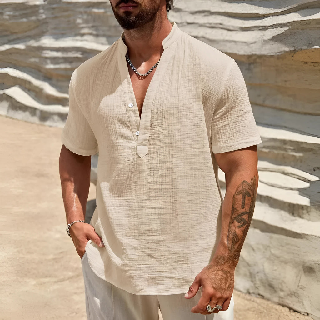 Men's solid colour short-sleeved stand collar casual shirt on a hanger.