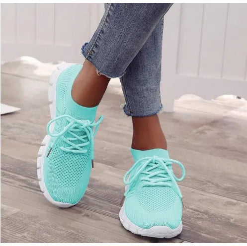 Women's high-cut lace-up platform sneaker in a choice of seven colours on a rubber sole.