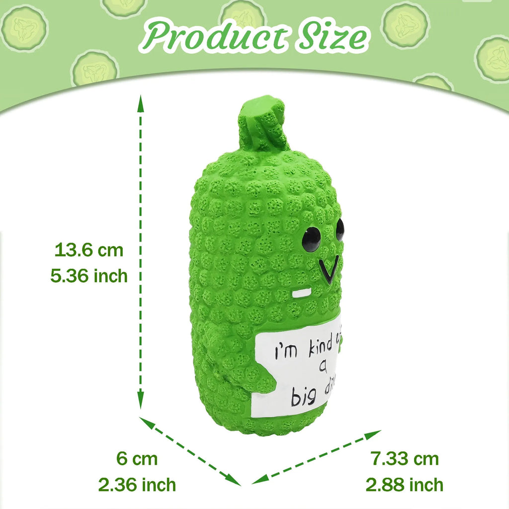 Green pickle-shaped squeaky dog chew toy with textured exterior for dental cleaning