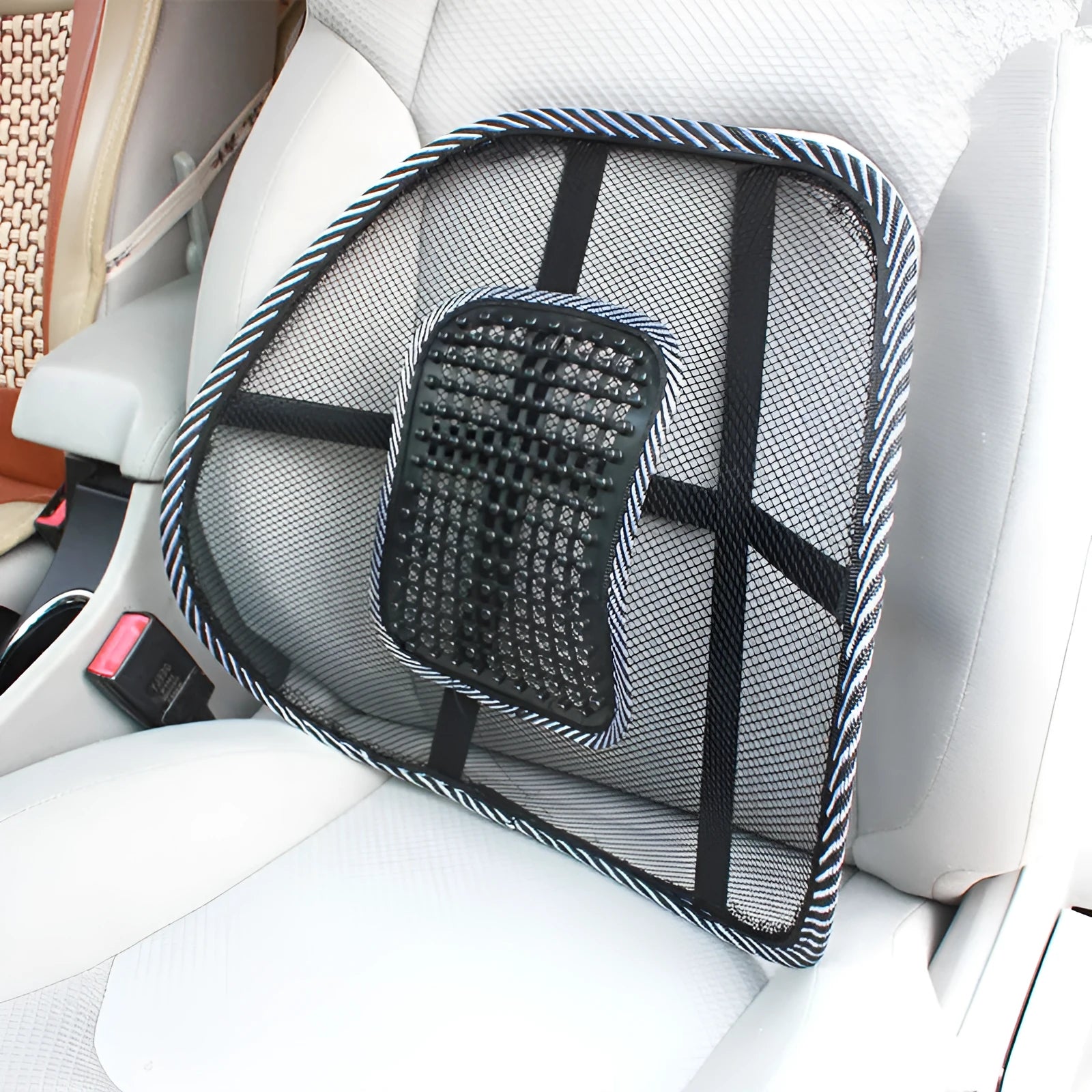 Black car lumbar support pillow with steel wire frame showing adjustable bending