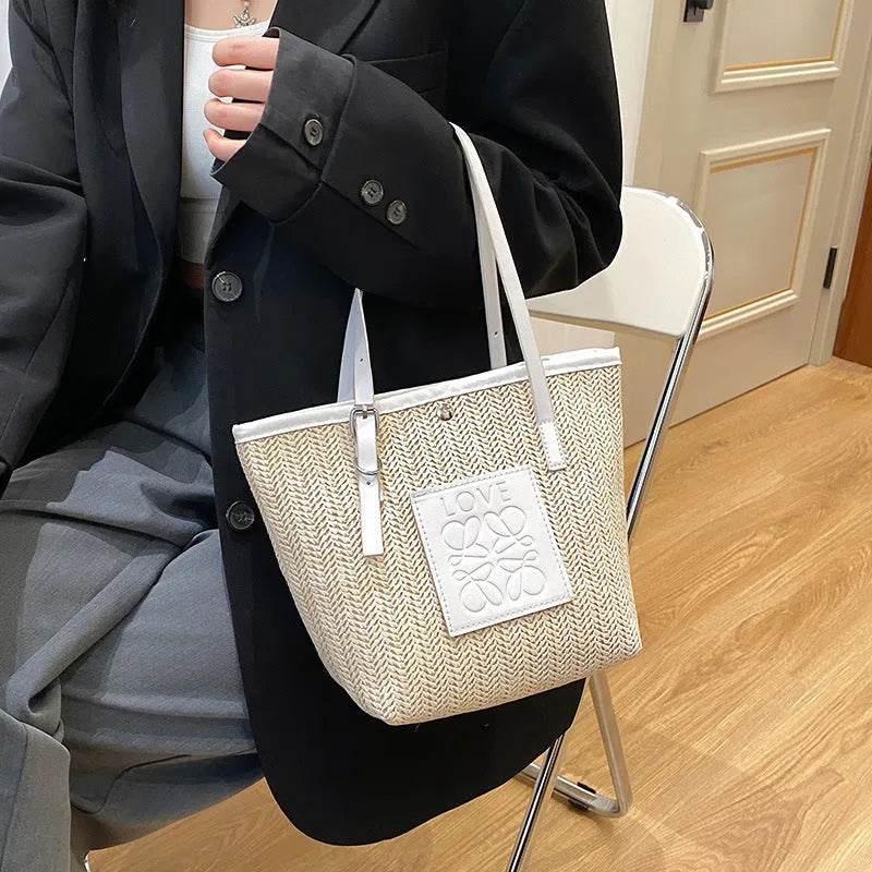 Straw woven women's shoulder bag in European retro style with large capacity and three-dimensional pockets
