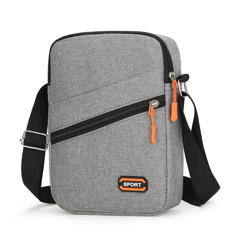 Ultra light Oxford cloth crossbody commuter bag in silver grey, black or navy blue.