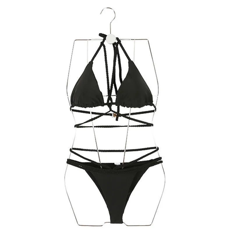 A black and a red two-piece nylon swimsuit bikini set for women, showing the separate top and pants.