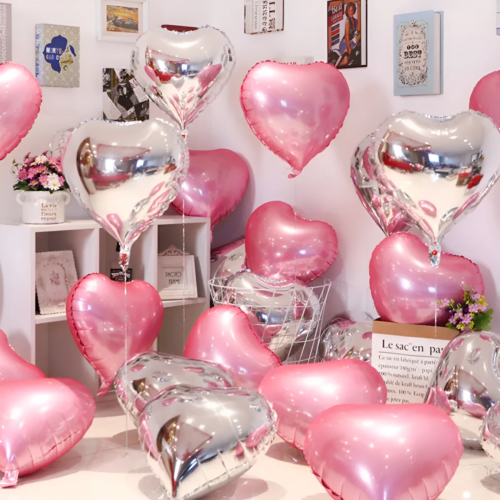 Five sparkling peach heart-shaped aluminium foil balloons in assorted colours on a white background.
