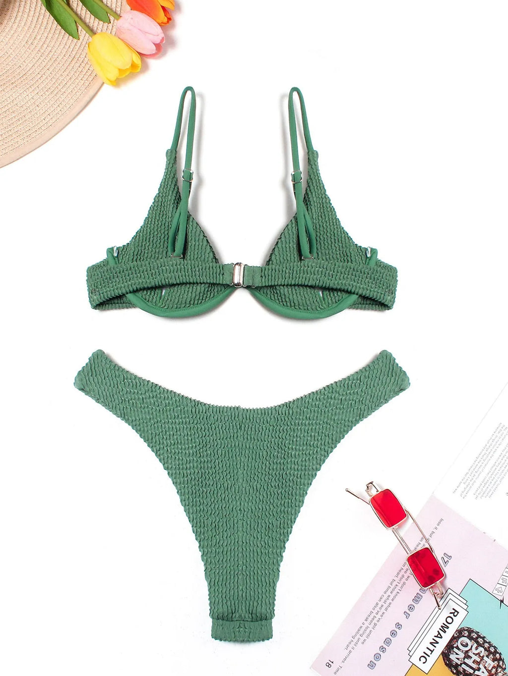Green women's bikini with ruffle detail on quick-dry polyester fabric.