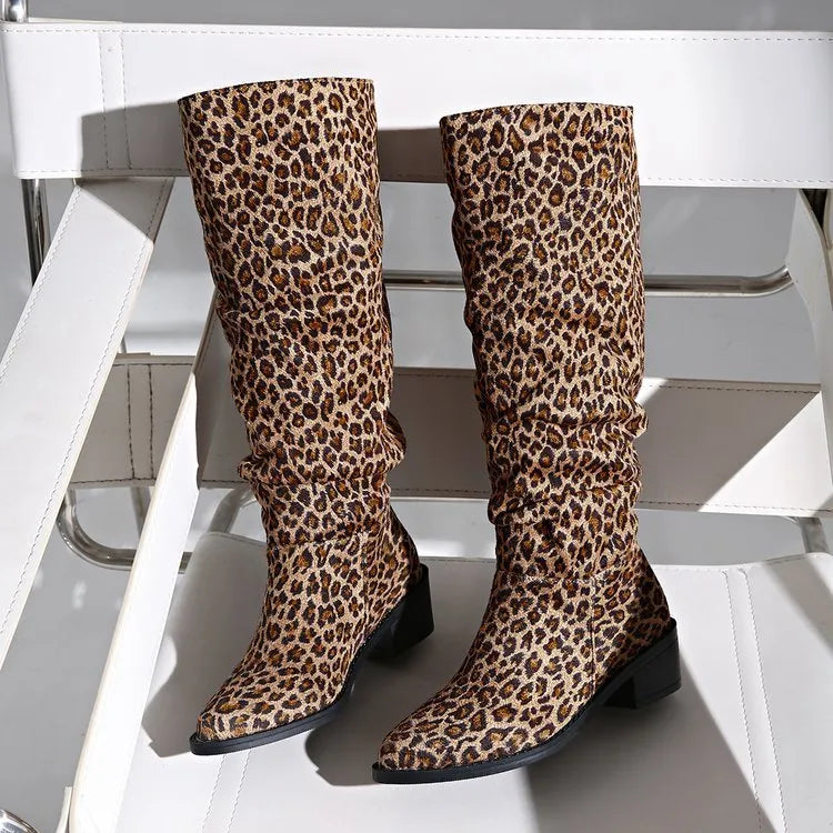 Brown leopard print women's boots with a square toe and chunky mid-height heel.