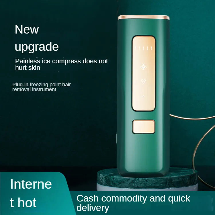 Laser hair remover permanent freezing point sapphire home use device in dark green or green, 150x67x36mm, with sunglasses and shaving knife.