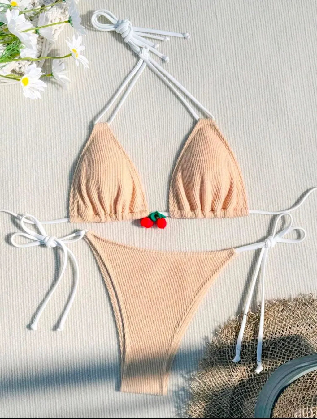 Nylon bikini swimsuit briefs in a solid colour on a mannequin